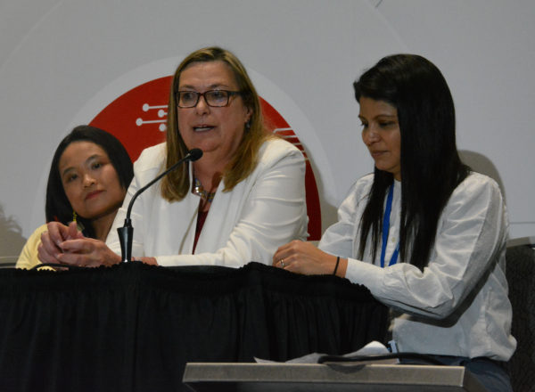 Melanie Daniels on WISE panel, flanked by Jocelyn Tan and Melissa Saelzer