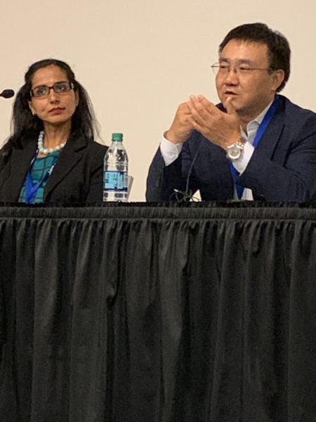 Junwei Bao answers a question as Radhika Arora looks on during "Battle of the Sensors" at the 2019 zAutonomous Vehicle Sensors Conference