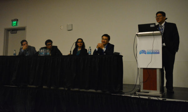 Junwei bao speaks during "Battle of Sensors" panel