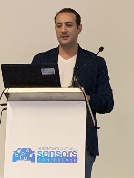 Modar Alaoui speaks from the Autonomous Vehicle Sensors Conference lectern 