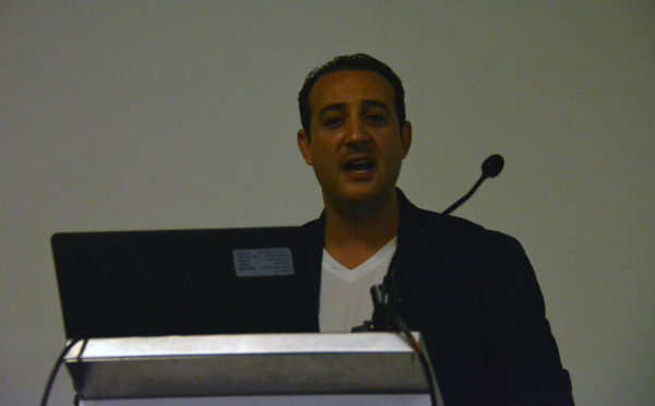 Modar Alaoui closeup from Autonomous Vehicle Sensors Conference podium during his speech