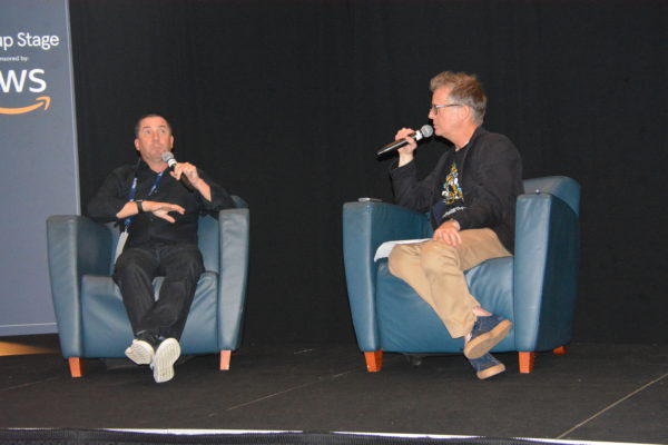 Moderator Michael Copeland talks with Startup Business Strategist Travlin McCormack during final Fireside Chat of TechDay LA 2019
