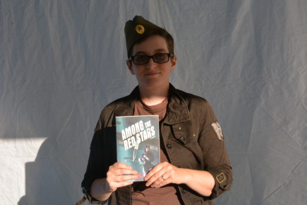 Author Gwen Katz with her book at San Gabriel Valley Pride 2019