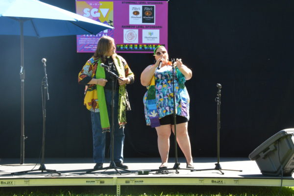 Reverend KC and Reverend Pat lead worship service from the stage