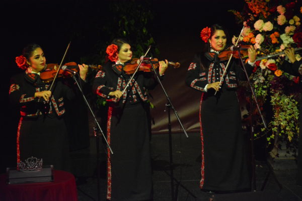 Three women violinists play during Mariachi Divas performance at Rose Queen® coronation program