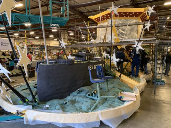 Model of USS Indianapolis, surrounded by stars, on the CAHF float