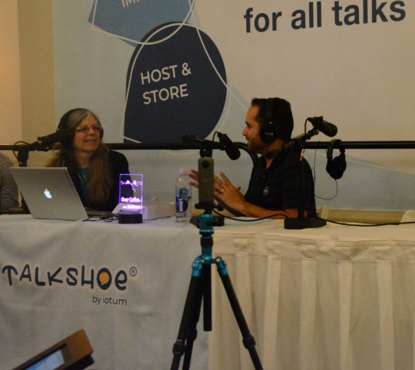 NASA Electronics Engineer and Bid and Proposal Manager Kelvin Ruiz makes a point to Over Coffee host Dot Cannon during live taping of the podcast onsite at the Talkshoe booth