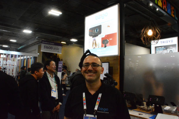 Bzigo Marcom Manager Ben Resnick at the Bzigo display in CES 2020's Eureka Park startup area