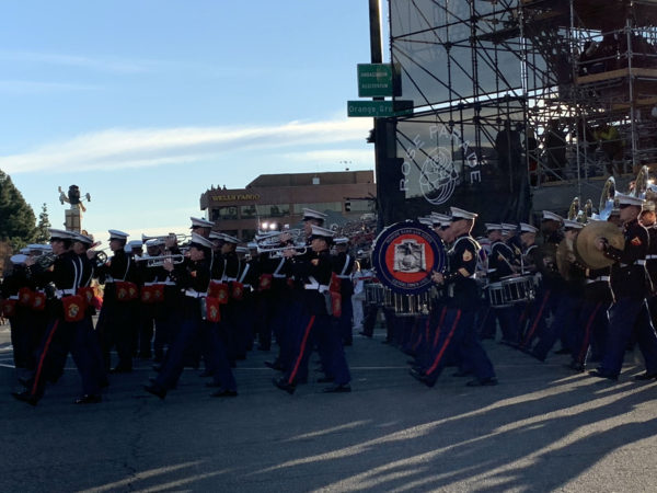 Marine band marches by with drums and cymbals