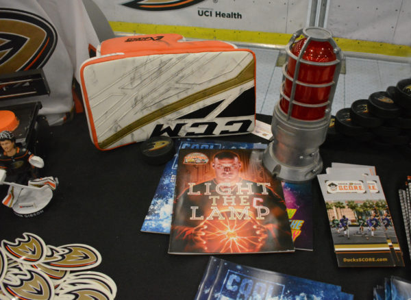 "Light the Lamp" materials for First Flight Field Trip, on display with a red goal lamp during California STeAM Symposium