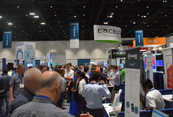 Attendees look at exhibits on Sensors Expo 2019 conference floor