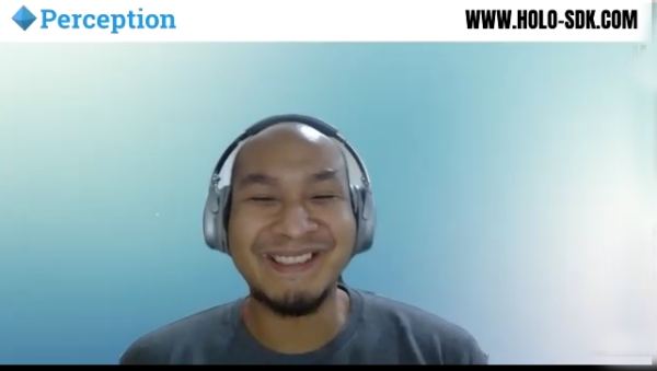 Perception founder Rabbit smiles against Perception and holo-sdk.com Zoom background