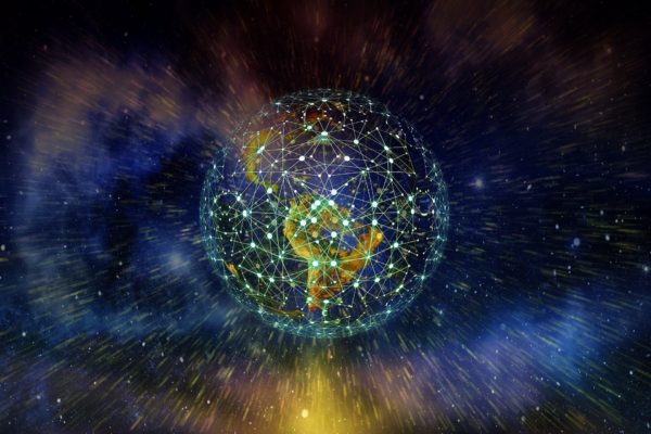 Digital network spans a globe against a dark, starry sky