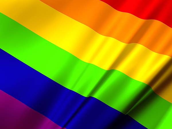 LGBT rainbow flag with stripes of purple, blue, green, yellow, orange and red