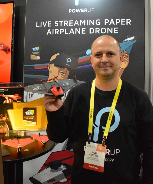 Shai Goitein with his PowerUp FPV paper airplane drone at CES' Eureka Park Marketplace.