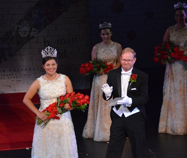 Tournament of Roses President Lance Tibbet applauds 100th Rose Queen Isabella Marie Marez after coronation