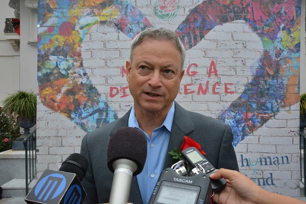 Gary Sinise talks to reporters