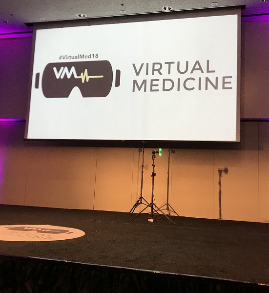 Virtual Medicine screen on stage