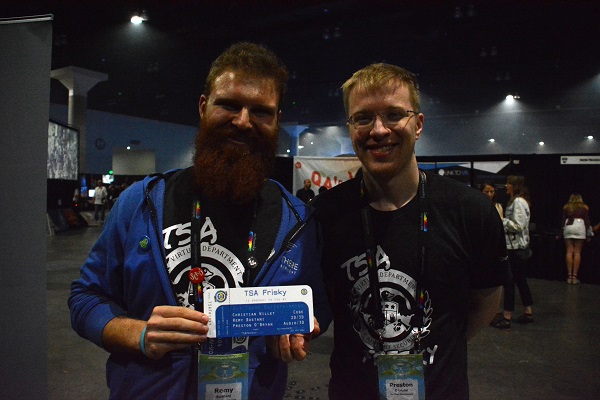 TSA Frisky co-creators Remy Bustani and Preston O'Brien with "boarding pass" promotional materials at VRLA 2018