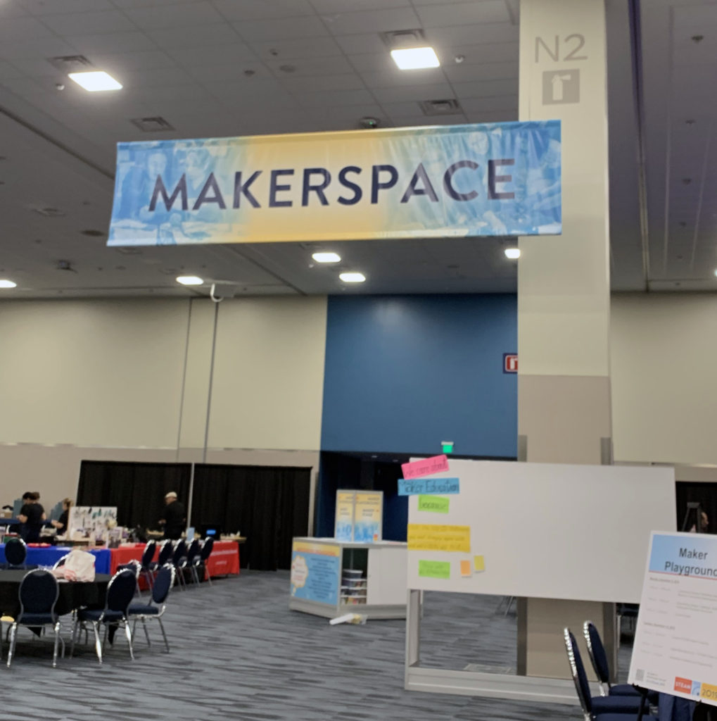 Makerspace sign over California STEAM Symposium area