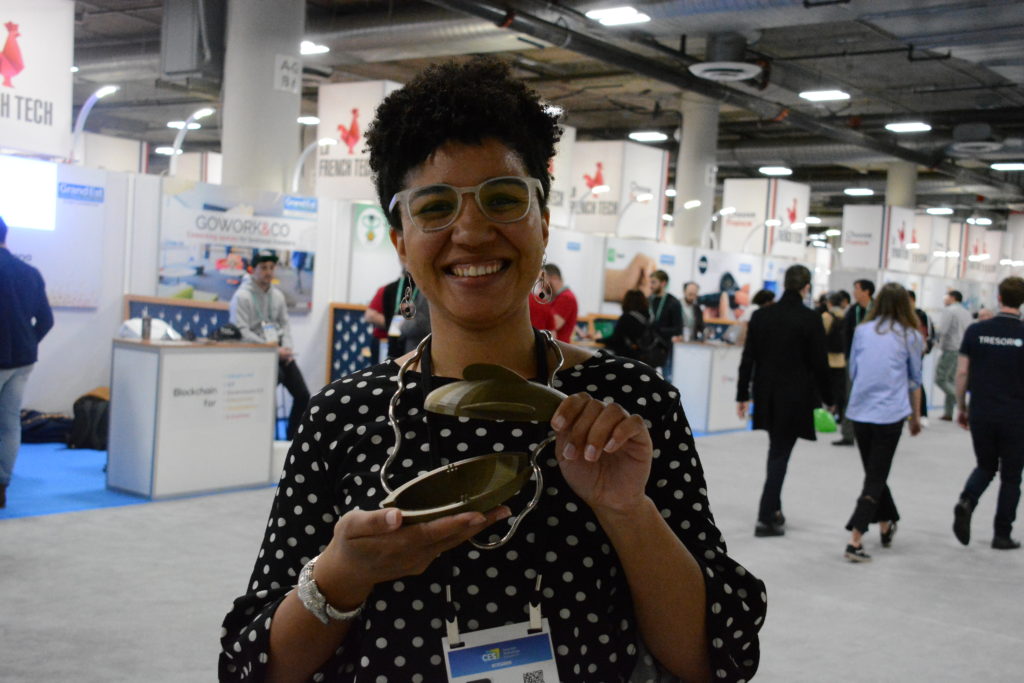 Pleasant Robotics Founder and CEO Gabriella Pleasant displays her P.E.T.E.R. robot after winning the "Student Startup Pitch Competition" during CES 2020