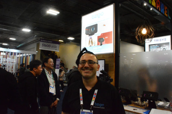 Ben Resnick smiles from 2020 Eureka Park startup floor as he exhibits Bzigo, an artifical-intelligence device that detects and kills mosquitoes.