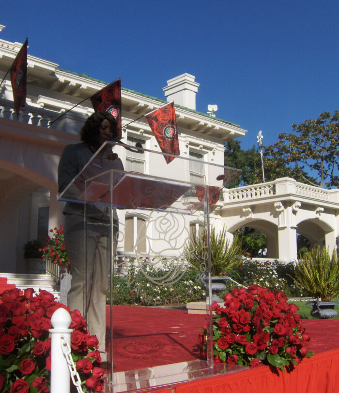 Tournament House with red roses in front of it