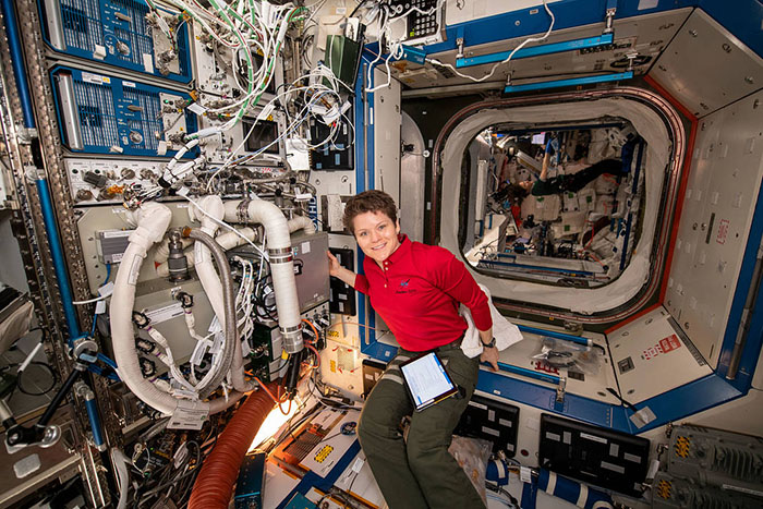 Anne C. McClain in the Destiny lab module aboard the International Space Station.