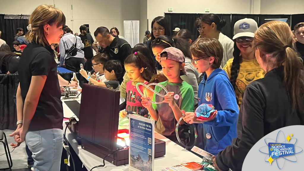 Students examine an exhibit at the Las Vegas Science and Technology Festival.