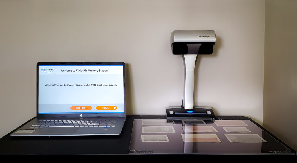 The Vivid-Pix Memory Station program, displayed on a computer atop a desk.