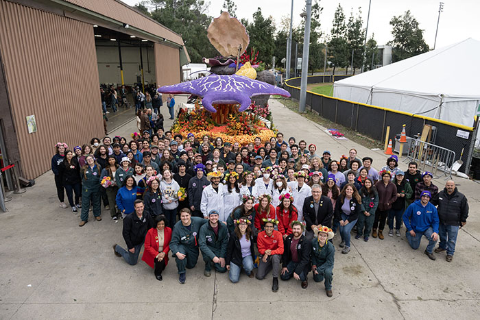 Students and administrators pose in a group outside "Shock 'N Roll" near the Rose Bowl in Pasadena.