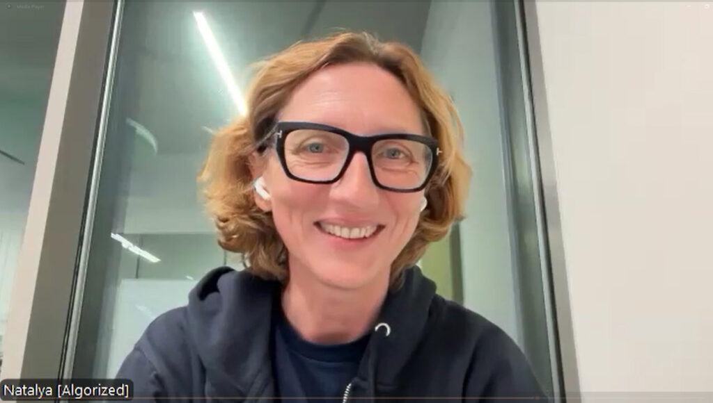 Algorized CEO/Co-Founder Natalya Loparea smiles against a Zoom background.