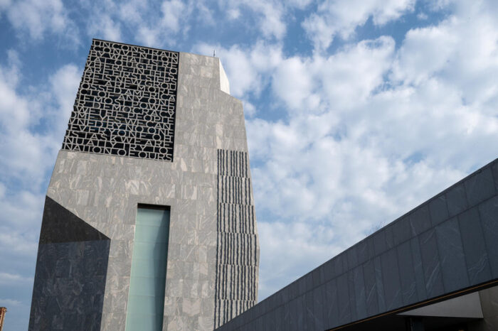 The Obama Presidential Center Museum against a blue sky.