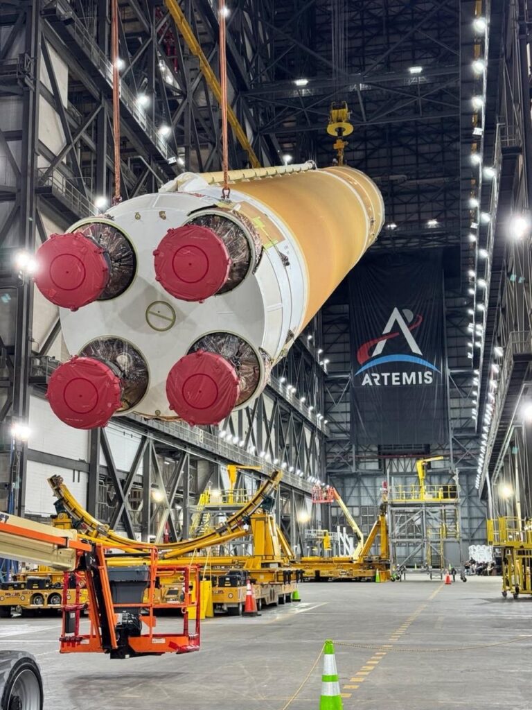Artemis III Core Stage gets lifted vertically at Kennedy Space Center.