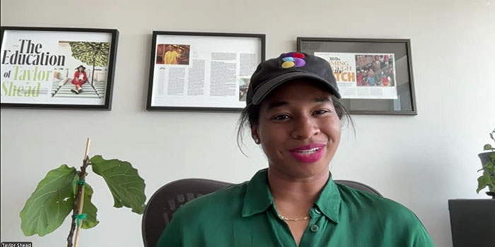 Stemuli Founder and CEO Taylor Shead, in her officce, smiles as she discusses Founder Tycoon.